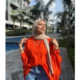 Orange double breasted ruffled blouse