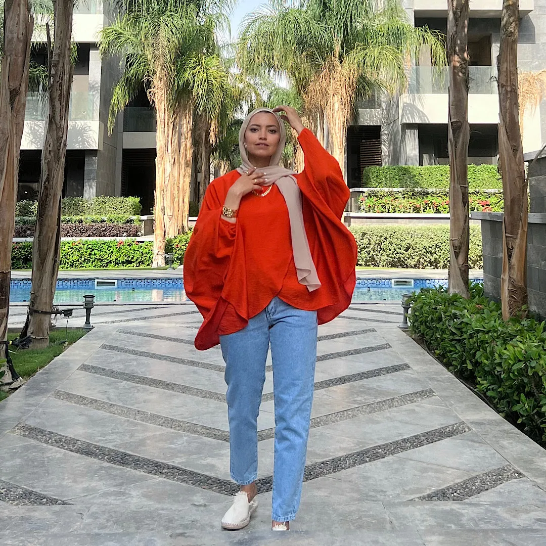 Orange double breasted ruffled blouse