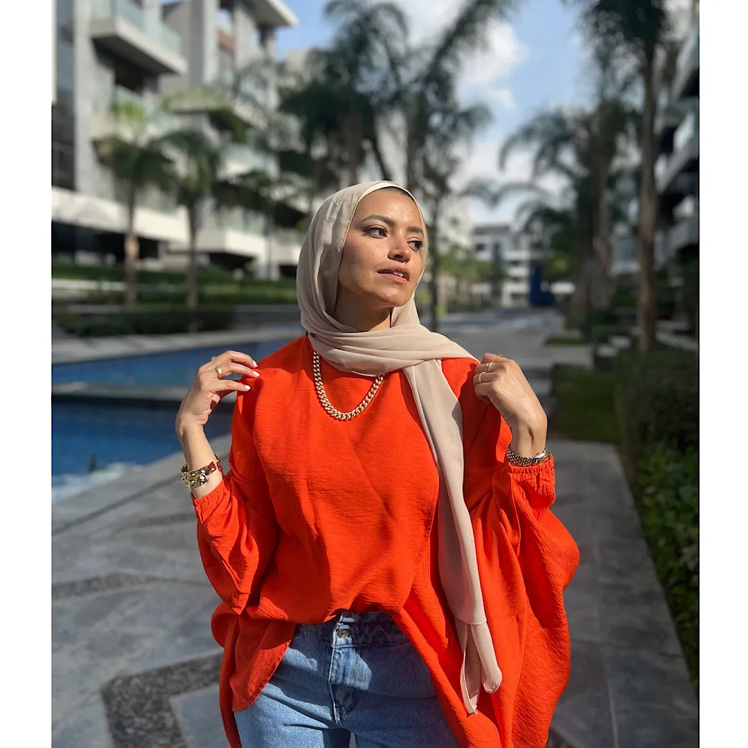 Orange double breasted ruffled blouse