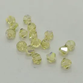 Swarovski - Cristalli bi-cono 4 mm - Jonquil AB (10 pz)